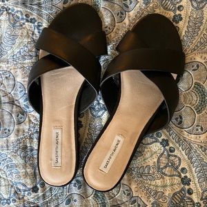 Saks Fifth Avenue black leather cross slides